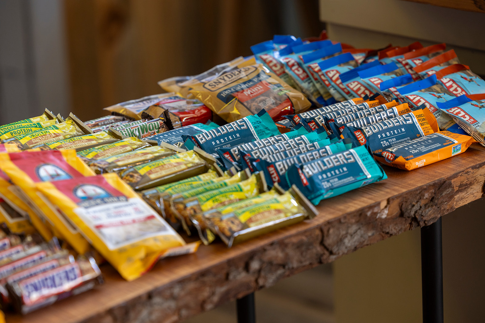 Selection of candy, snack bars, and packaged snacks